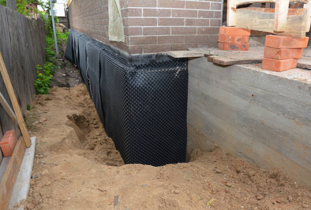 Happy homeowners after waterproofing job in Joppa